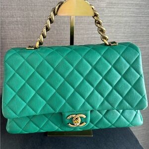 Authentic vintage Chanel Green Quilted Leather Bag. Excellent condition.
